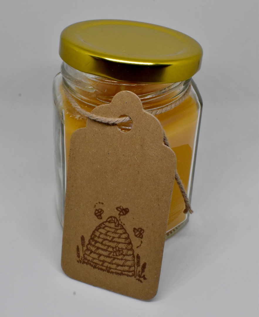 Handmade pure beeswax candle in glass jar