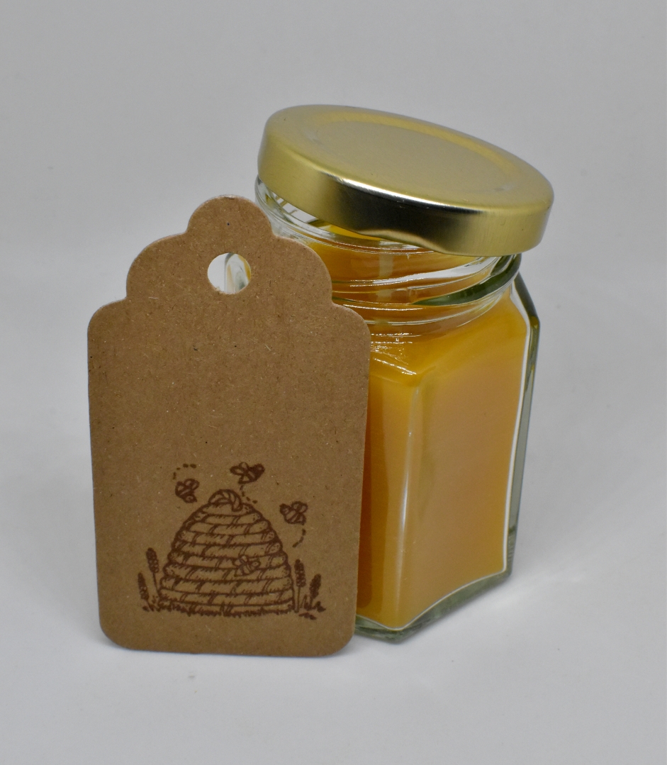 Handmade pure beeswax candle in glass jar