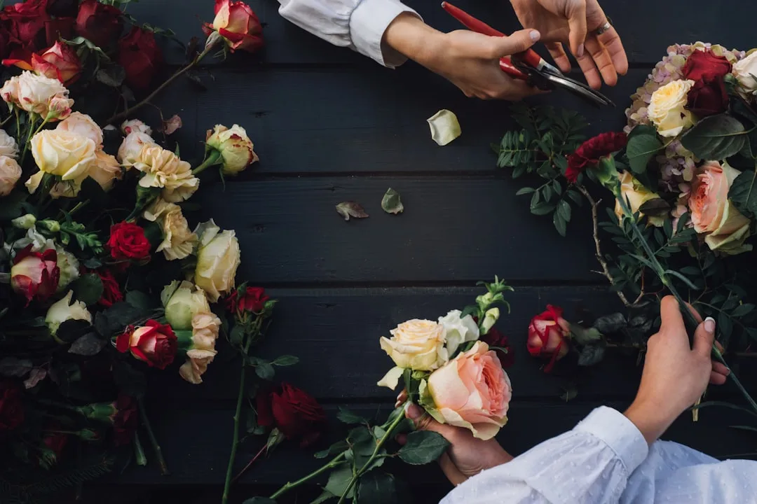 Cut flower stems and foliage on a florist's workbench