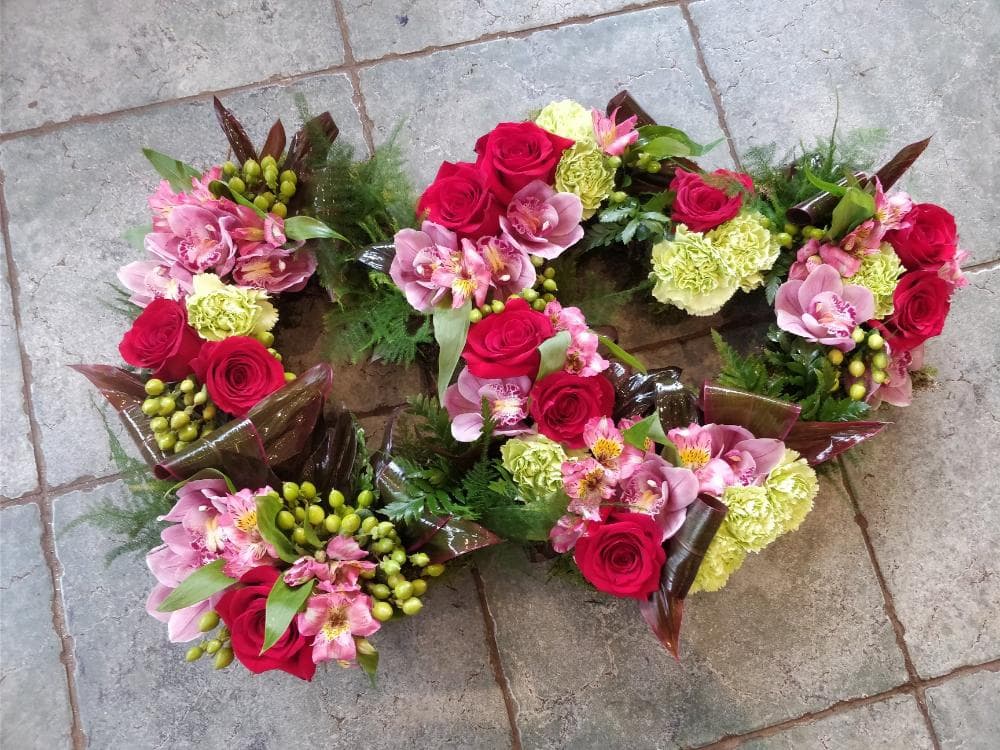 Double heart floral tribute handcrafted by Edith Wilmot, Bristol florist