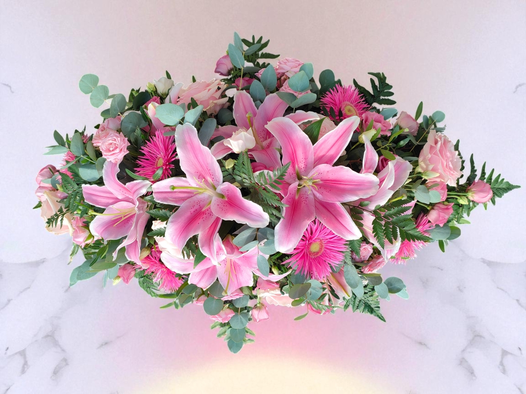 Blushing Tribute   Casket Spray