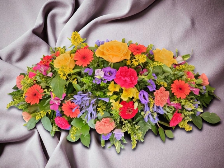 Vibrant Casket Spray.