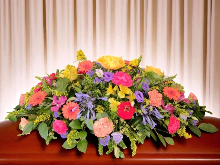 Vibrant Casket Spray.