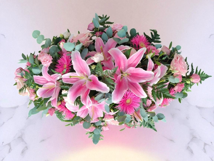 Blushing Tribute   Casket Spray