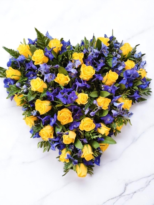 Colourful heart funeral tribute
