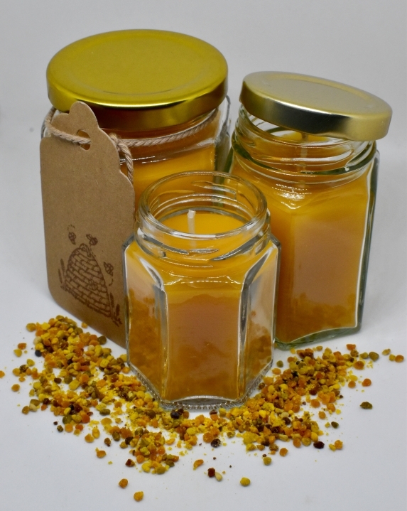 Handmade pure beeswax candle in glass jar