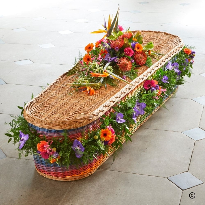 Tropical Harmony Rainbow Casket Tribute with Garland